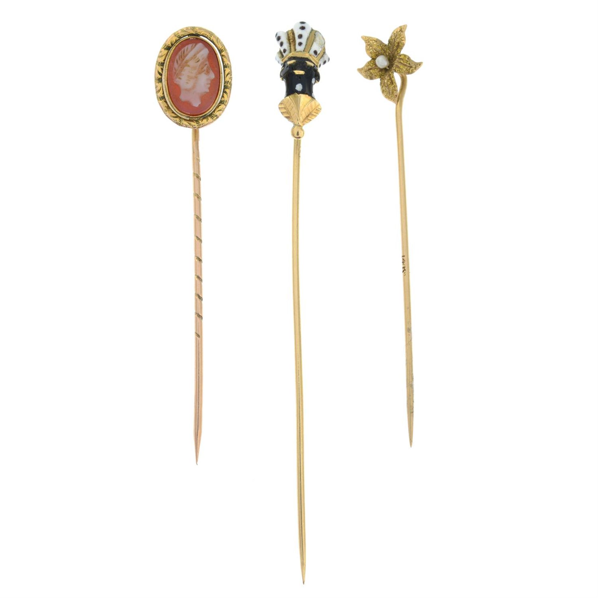 Three early 20th century gem-set stick pins.