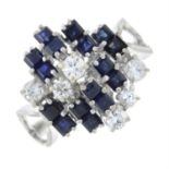 A mid 20th century sapphire and diamond abstract cluster ring.