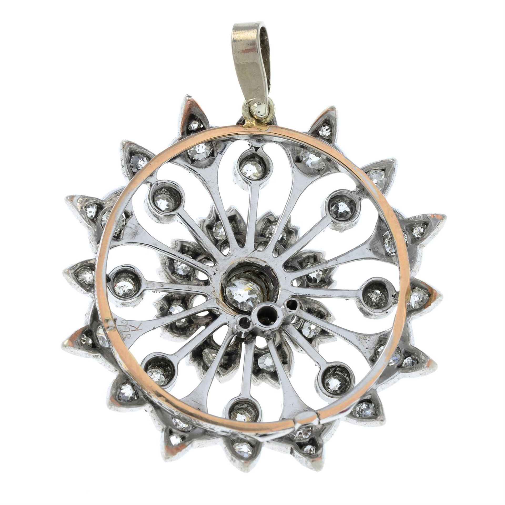 A late Victorian silver and gold, circular-cut diamond floral pendant. - Image 2 of 5