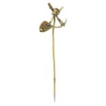 An early 20th century gold digger stickpin.