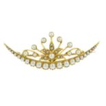 An early 20th century 15ct gold split and seed pearl crescent brooch.