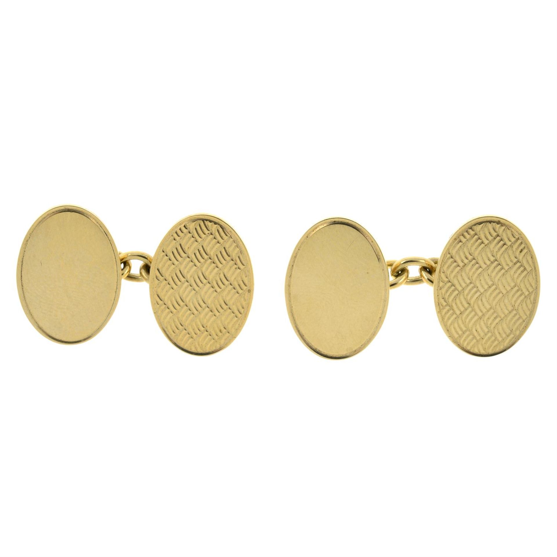 A pair of 9ct gold oval cufflinks.