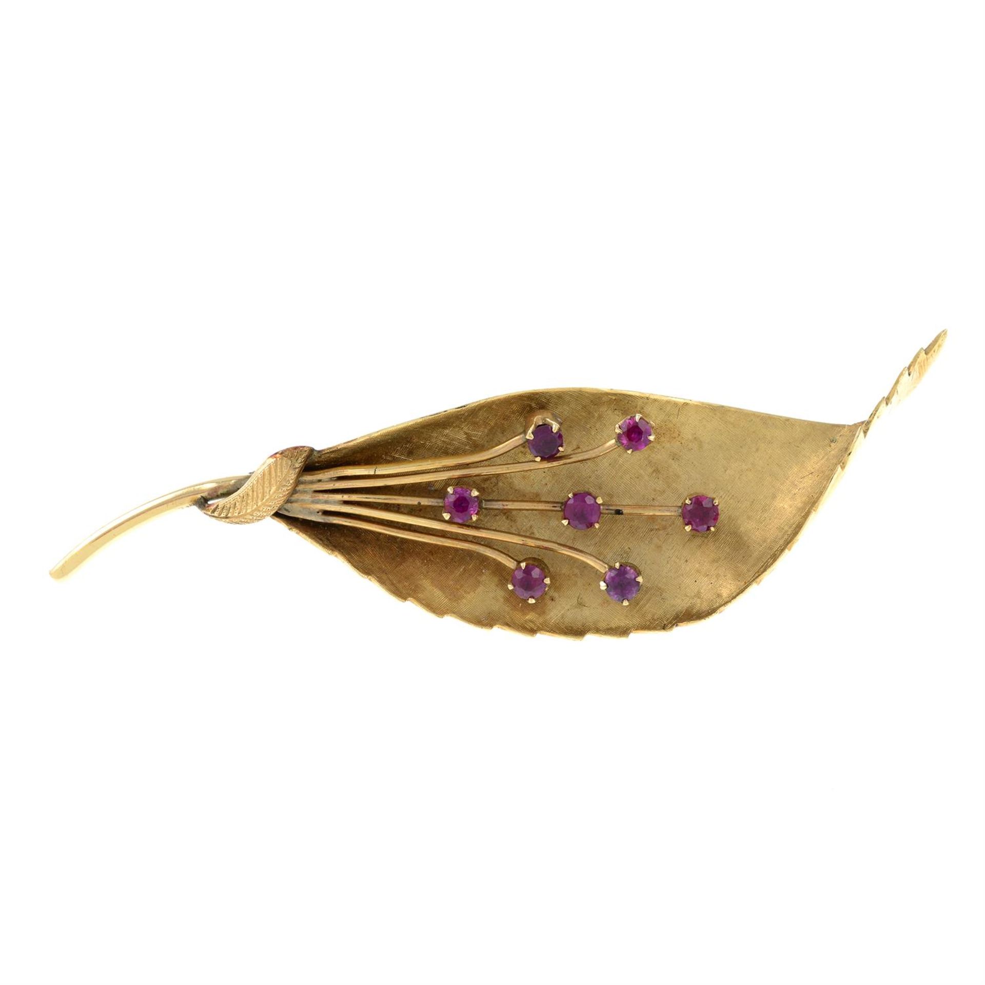 A ruby leaf brooch.