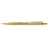 A mid 20th century 9ct gold pen.