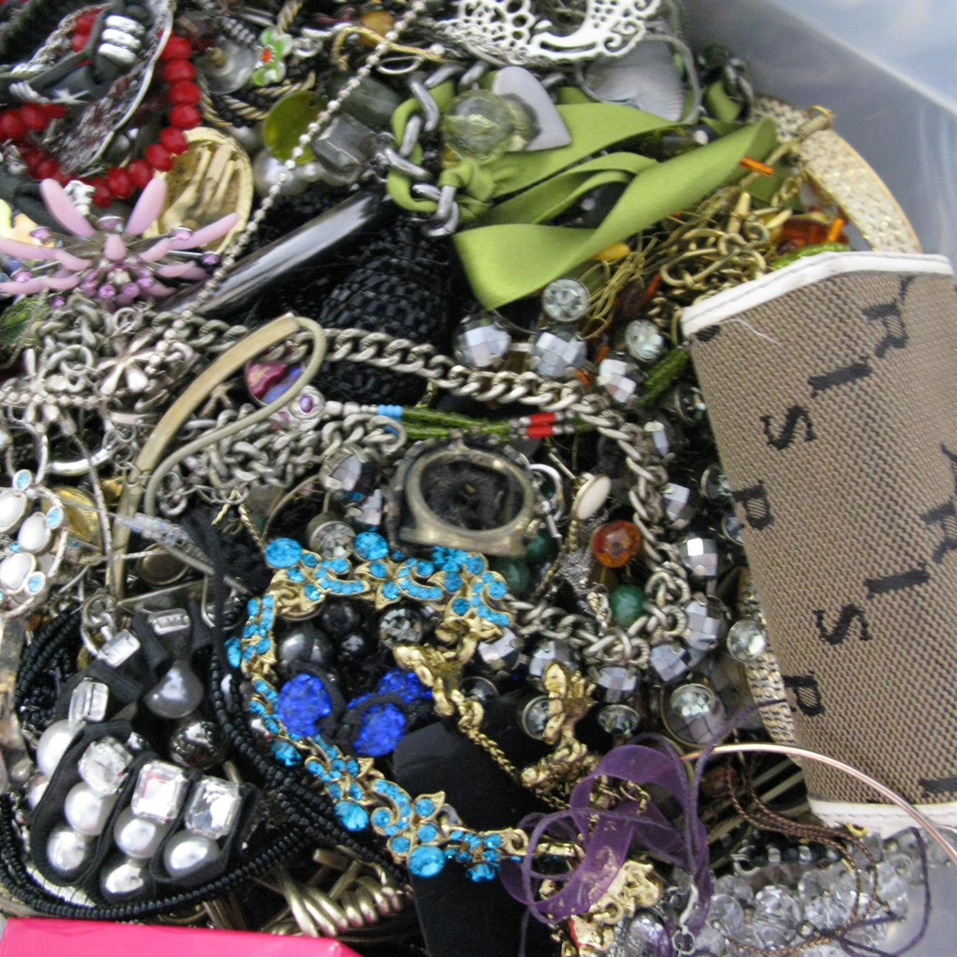 A bag containing a large quantity of costume jewellery. Many AF. - Image 2 of 2