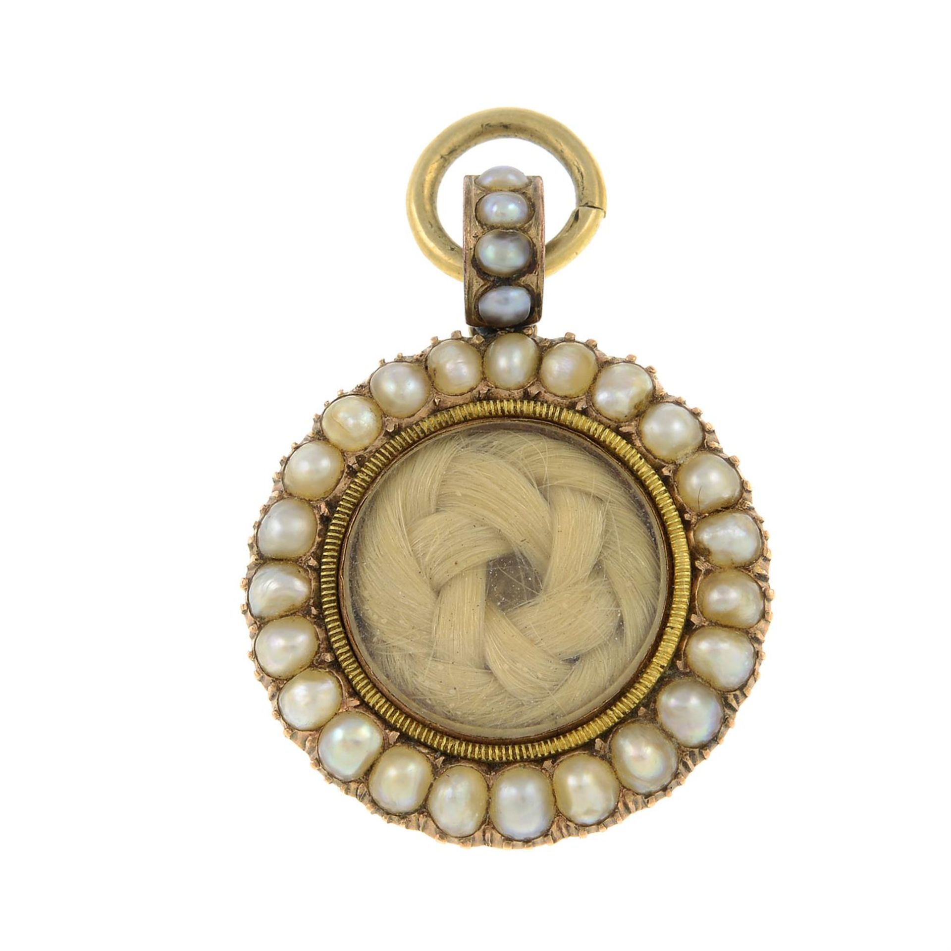 A Georgian gold split pearl and woven hair memorial locket pendant.