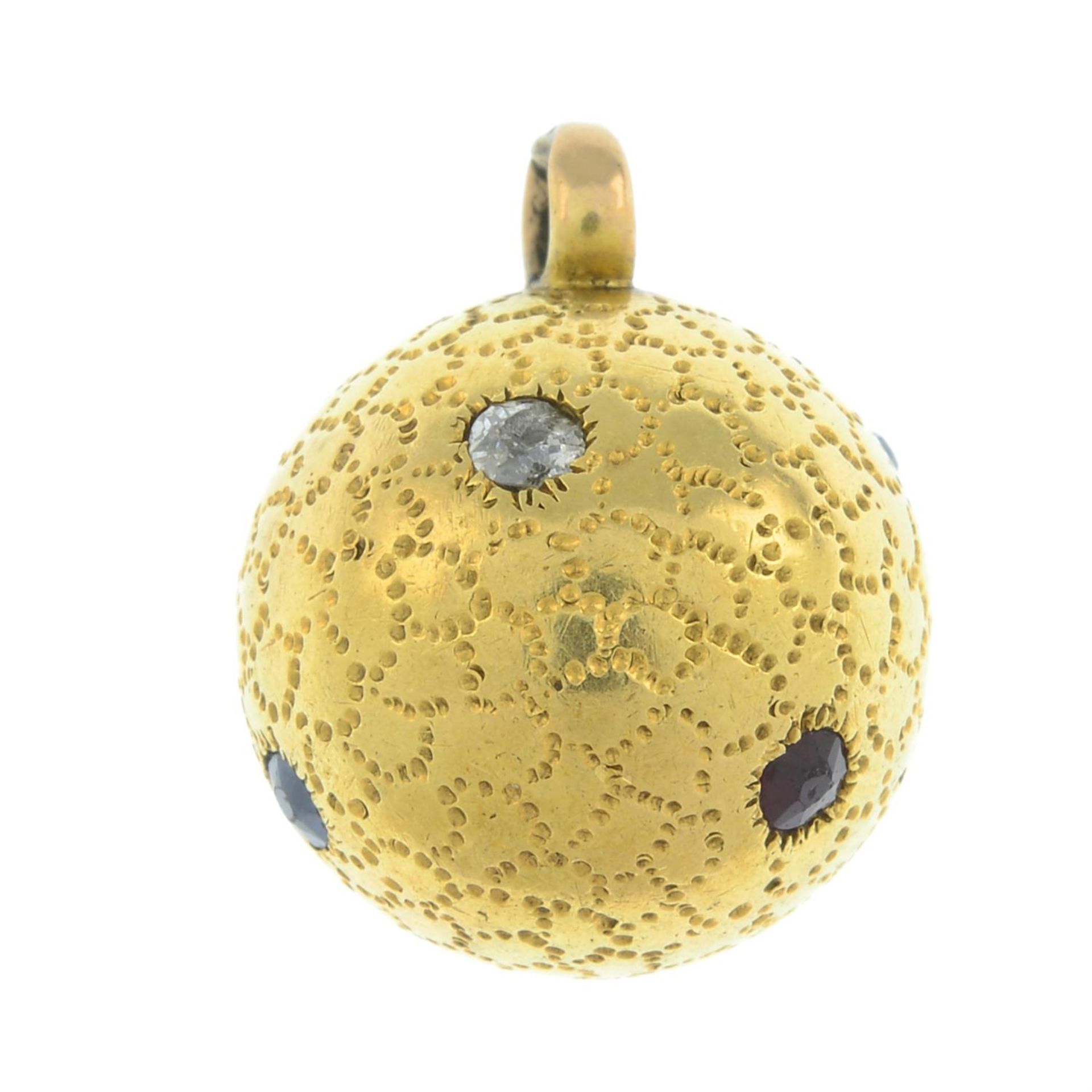 A late Victorian gold diamond, sapphire and ruby spherical pendant.