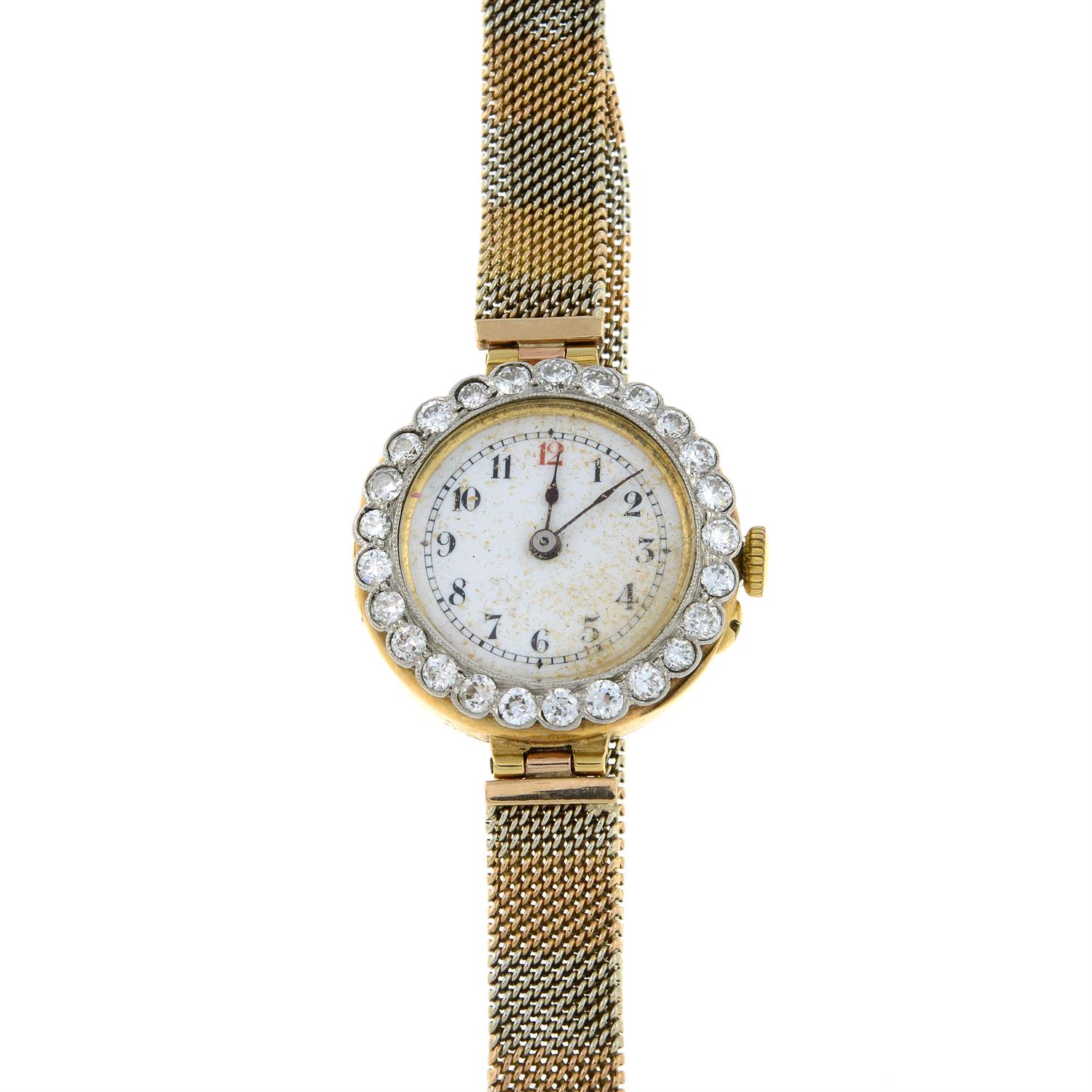 An early 20th century 18ct gold circular-cut diamond wrist watch, with bi-colour 9ct gold