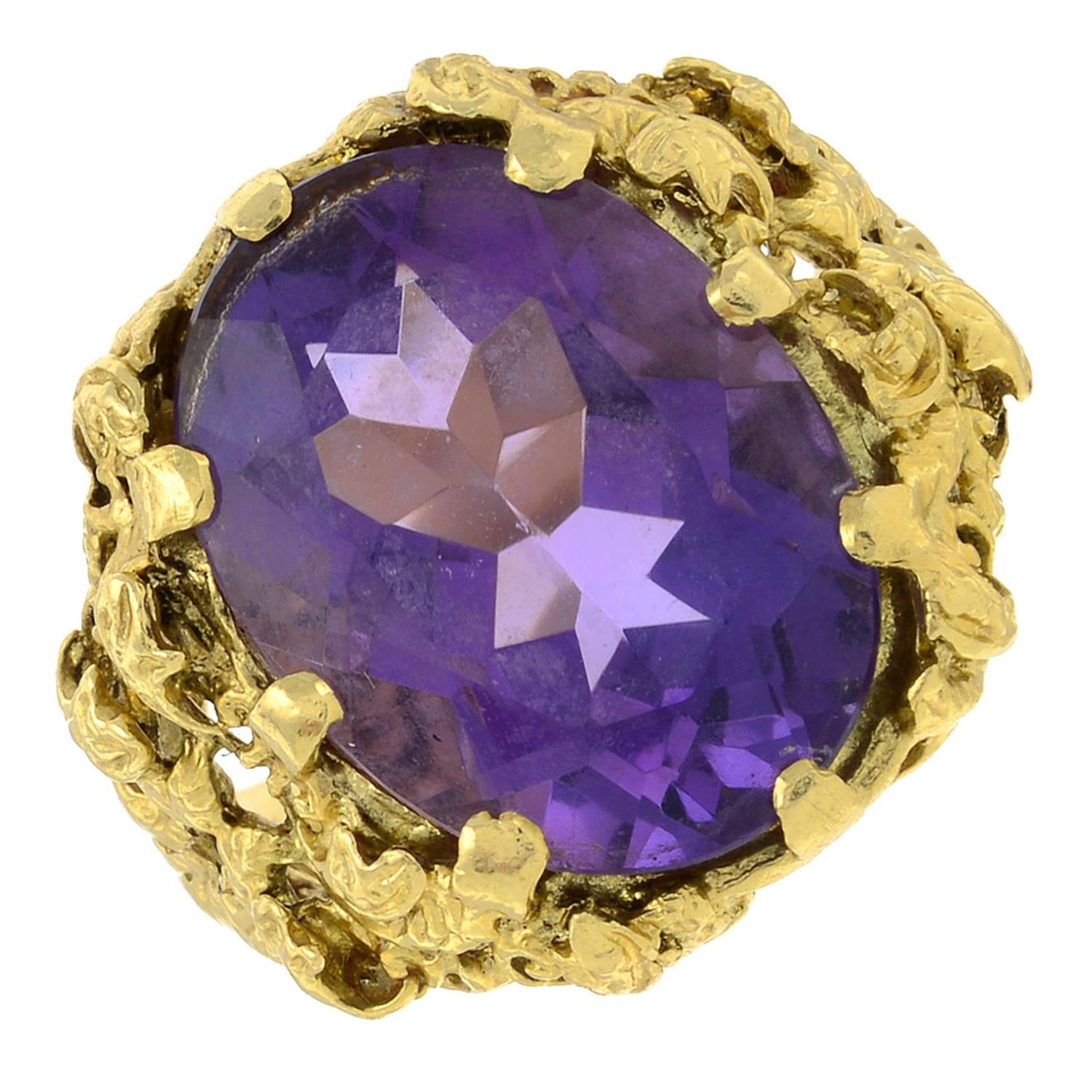 An amethyst single-stone ring.