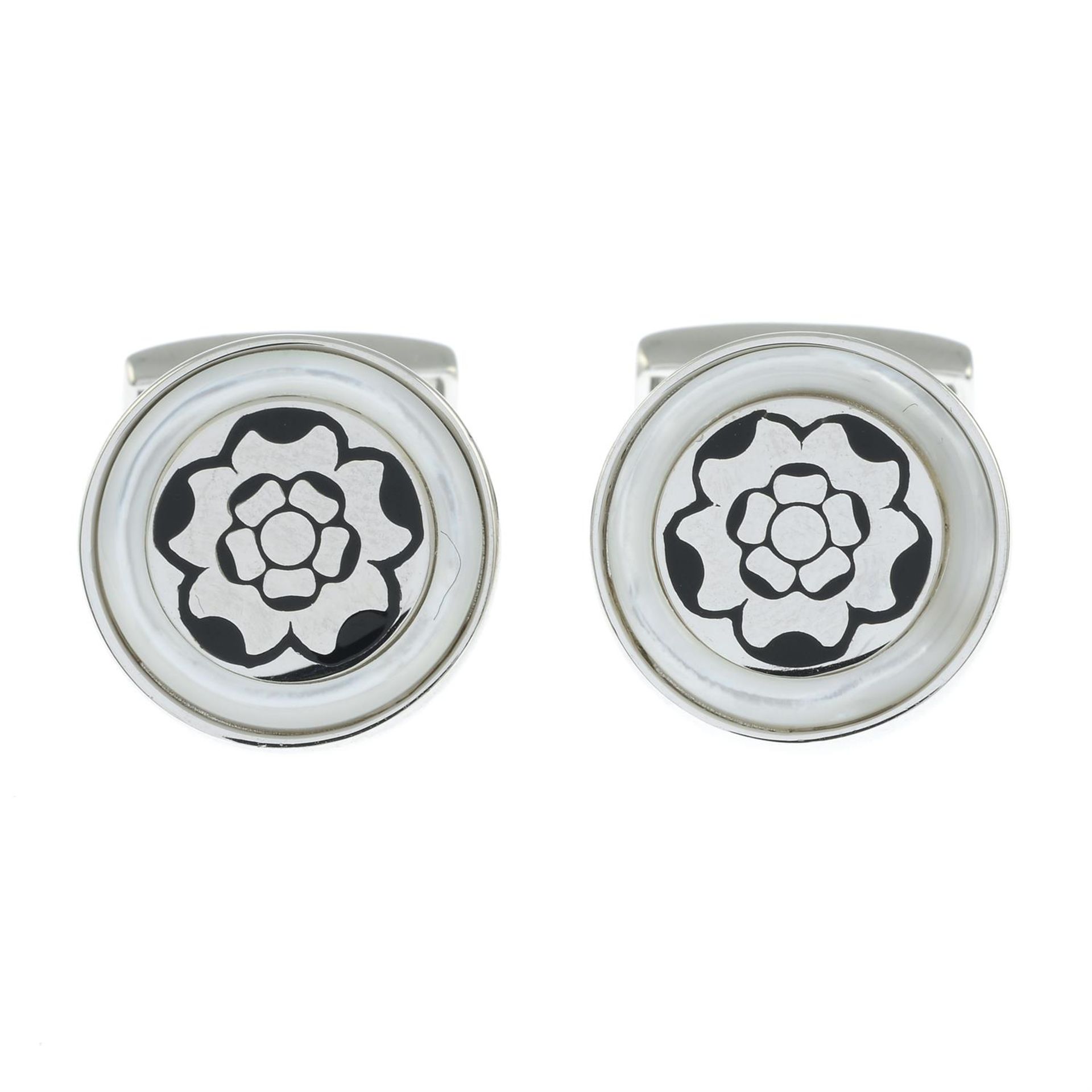 A pair of enamel silver cufflinks, by PD Man.