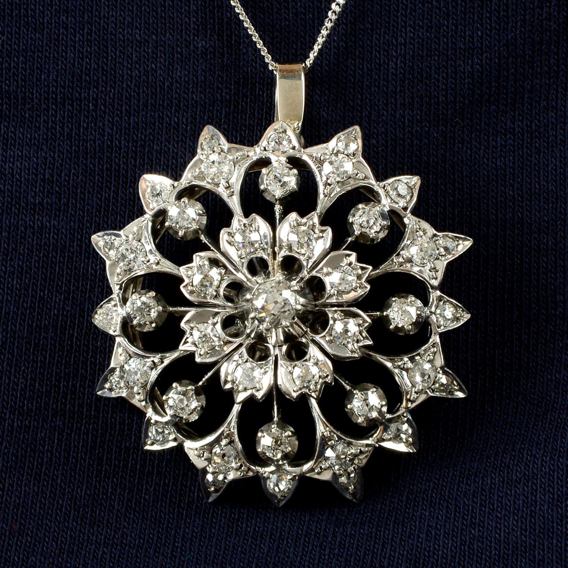 A late Victorian silver and gold, circular-cut diamond floral pendant. - Image 4 of 5