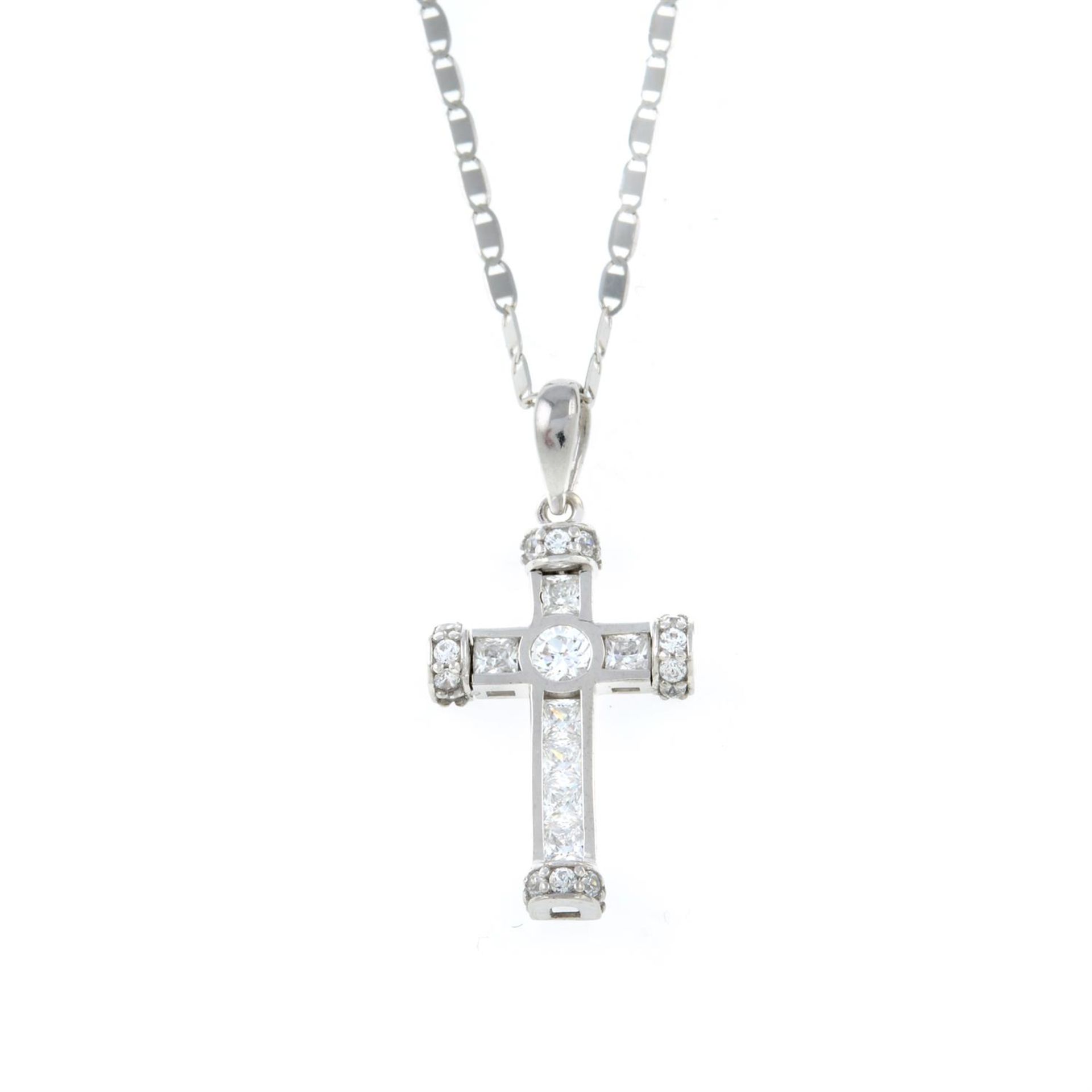 An 18ct white gold cubic zirconia cross pendant, with chain.