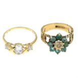 A 9ct gold emerald and diamond cluster ring and a 14ct gold cubic zirconia three stone ring.