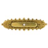 An early 20th century 15ct gold single split pearl set brooch.