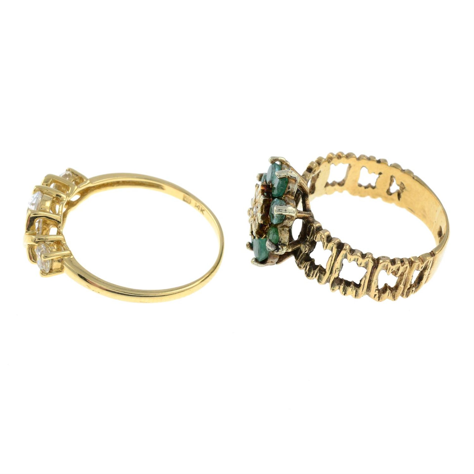 A 9ct gold emerald and diamond cluster ring and a 14ct gold cubic zirconia three stone ring. - Image 2 of 3