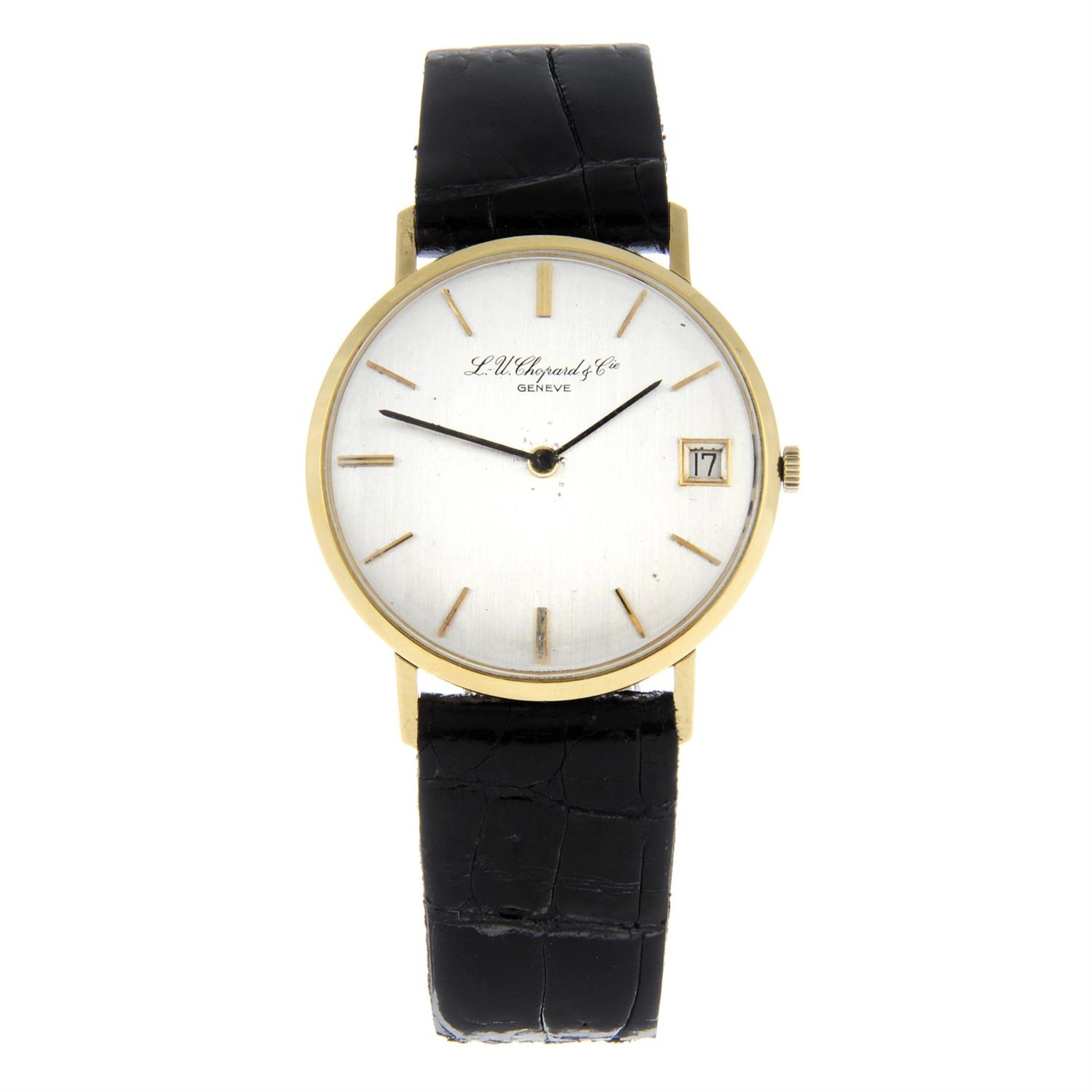 CHOPARD - a yellow metal wrist watch, 33mm.