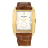 PATEK PHILIPPE - an 18ct yellow gold Gondolo wrist watch, 33mm.