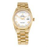 ROLEX - an 18ct yellow gold Oyster Perpetual Day-Date bracelet watch, 36mm.