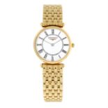 CURRENT MODEL: LONGINES - a lady's 18ct yellow gold Agassiz bracelet watch, 22mm.