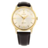 OMEGA - a gold plated Genève wrist watch, 34mm.