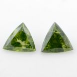 Two triangular shape HPHT treated 'green' diamonds, weighing 1.26ct