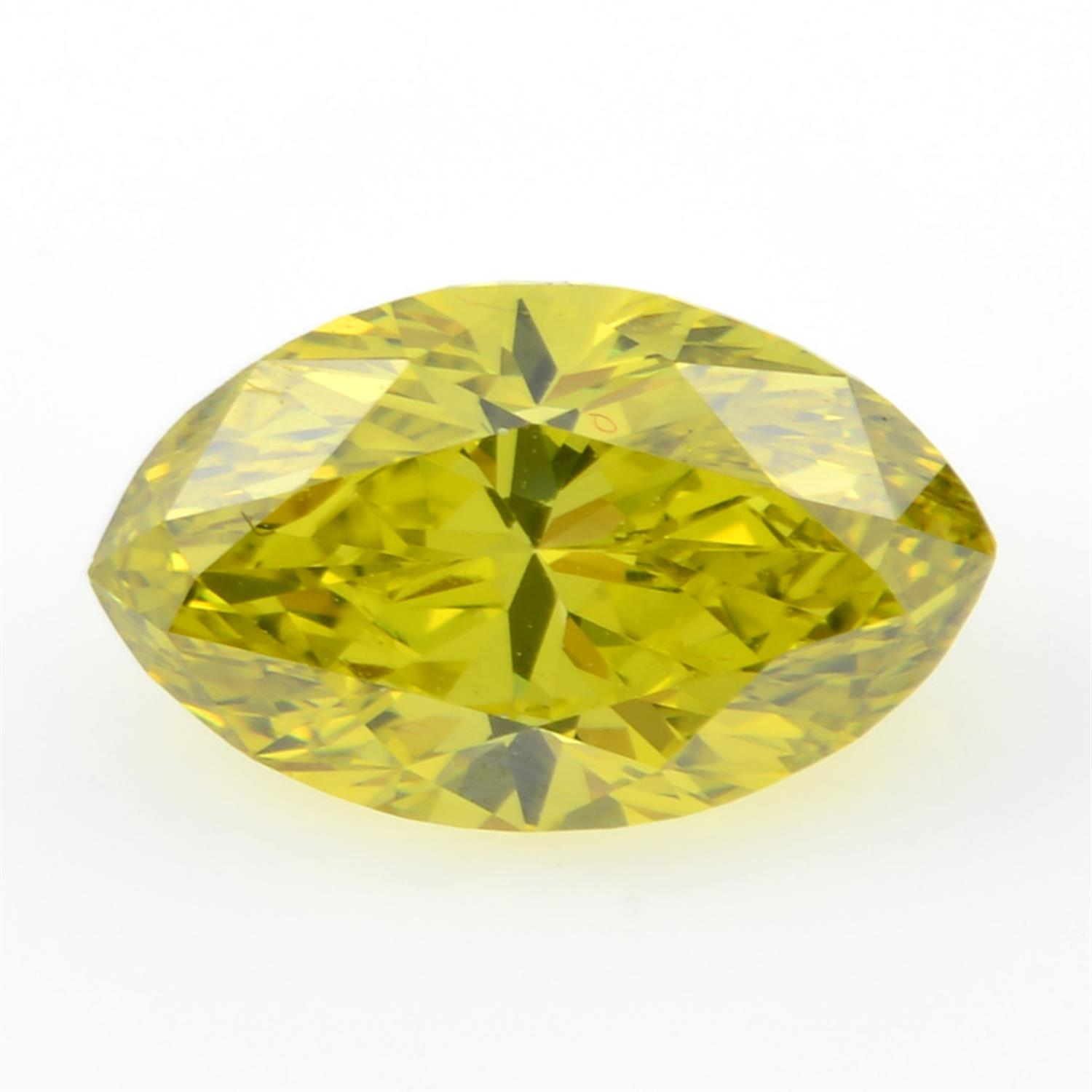 STUART DEVLIN STOCK - A marquise shape 'yellow' diamond, weighing 1.34ct