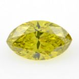 STUART DEVLIN STOCK - A marquise shape 'yellow' diamond, weighing 1.34ct