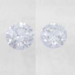 Pair of brilliant cut diamonds, weighing 0.62ct. Within IGI security seal
