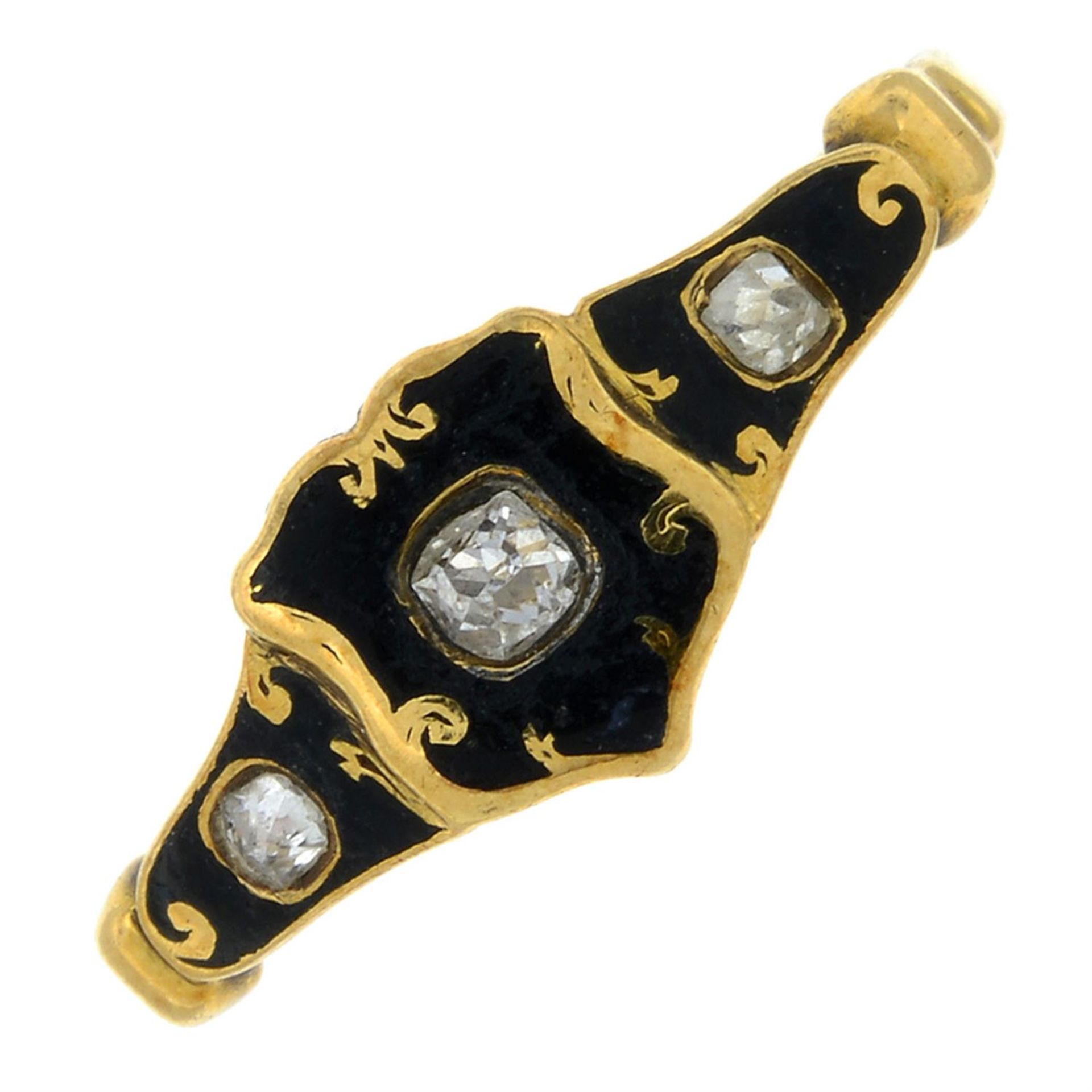 A 19th century18ct gold old-cut diamond and black enamel mourning ring with internal locket.