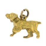 An early 20th century 9ct gold dog charm pendant.