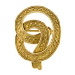 A mid 19th century gold ribbon brooch.