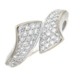 An 18ct gold pave-set brilliant-cut diamond dress ring.