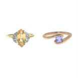A 9ct gold orange garnet and colourless gem ring and a 9ct gold tanzanite single stone ring.
