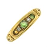 An early 20th century 18ct gold demantoid garnet and old-cut diamond band ring.