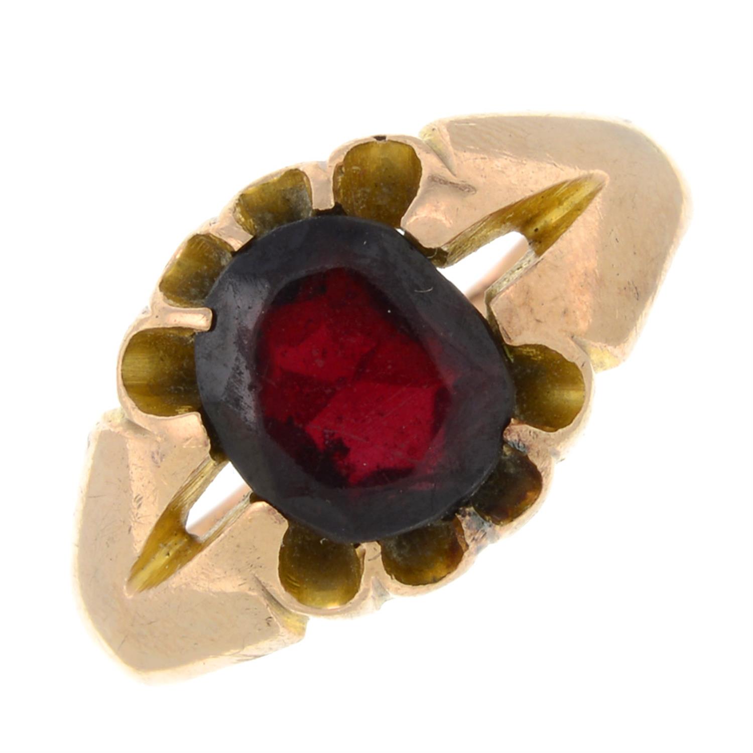 An early 20th century 9ct gold garnet single-stone ring.