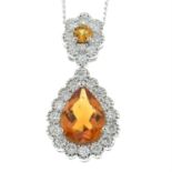 An 18ct gold pear-cut citrine and diamond cluster pendant with chain.
