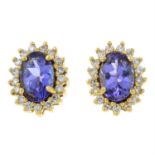 A pair of 18ct gold tanzanite and brilliant-cut diamond cluster earrings.