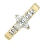 An 18ct gold marquise-shape diamond ring, with baguette-cut diamond sides.