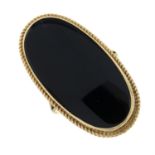 A 9ct gold onyx single-stone ring.