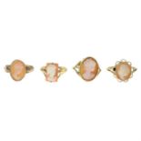 Four shell cameo rings.