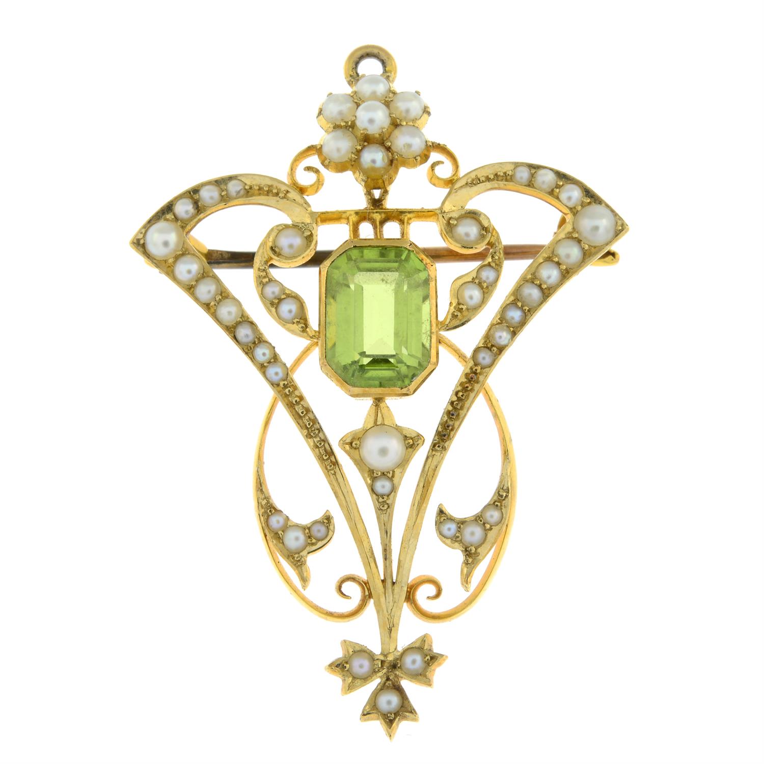 An early 20th century 15ct gold peridot and split pearl brooch.