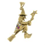 A 9ct gold gem-set articulated pendant of a witch.