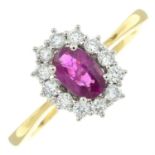 An 18ct gold ruby and diamond cluster ring.