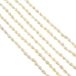 Three cultured freshwater pearl single-strand necklaces.