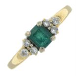 A 9ct gold emerald and brilliant-cut diamond ring.