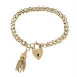 A 9ct gold two-row belcher chain bracelet, with heart lock clasp and tassel charm.