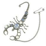 A late 19th century silver moonstone scorpion brooch.