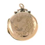 A Victorian, 9ct gold, locket engraved with a pair of swallows amongst floral surround.