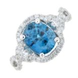 A blue zircon and brilliant-cut diamond dress ring.