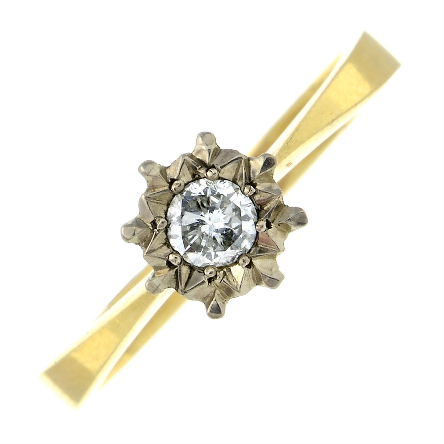 An 18ct gold illusion-set diamond single-stone ring.